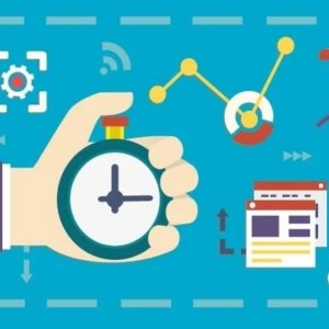 a hand holding a stopwatch